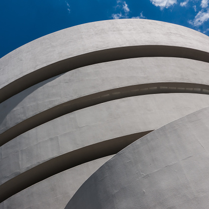 New York City, USA - August 13, 2015: External daylight view of the landmark Guggenheim Museum in Upper East Side of New York City. Designed by Frank Lloyd Wright, the famous art museum was completed in 1959.
