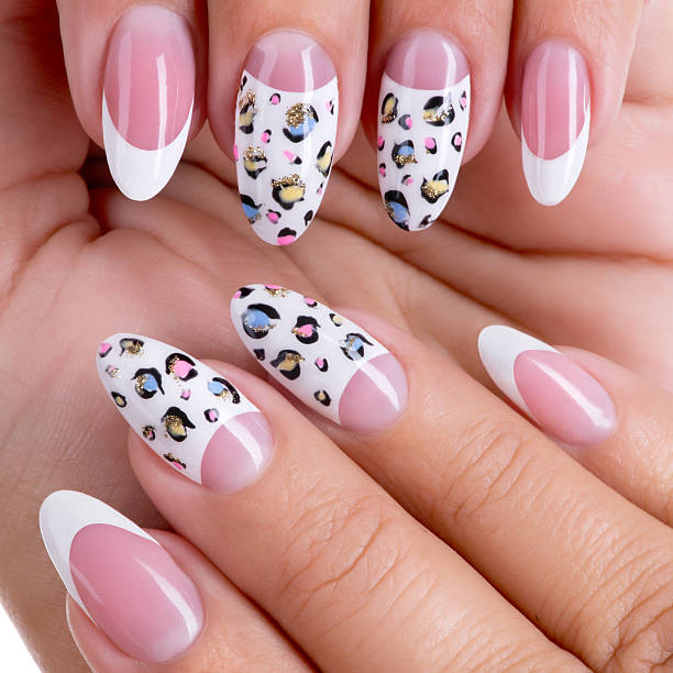 istock Beautiful woman's nails with french manicure 521425946