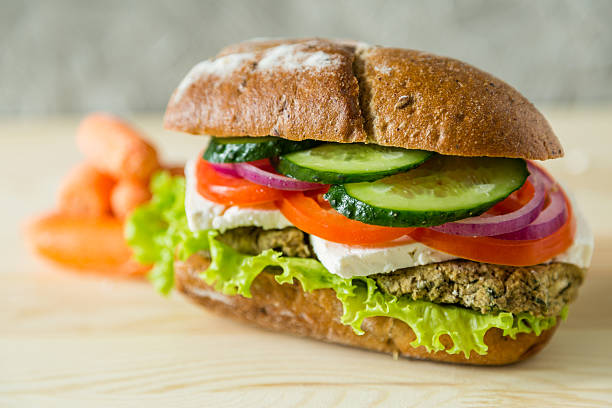 istock Vegan sandwich in lunch box with carrots and nuts 521426600