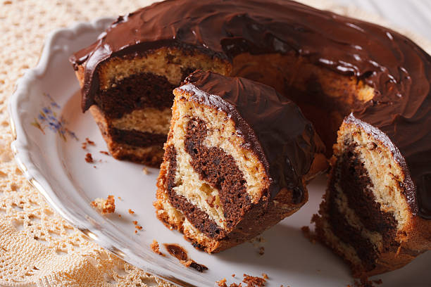 istock marble cake with chocolate frosting cut close-up. horizontal 521427930