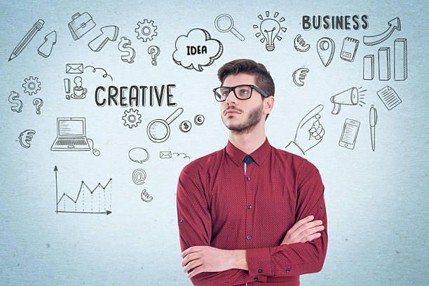 istock Young business man looking up and planning. Graphic sketch style 521429582