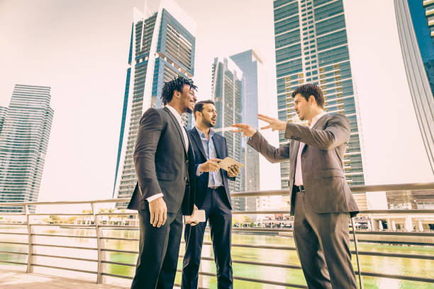 istock Business Executives having fun with their digital tablet and smartphone 521431984