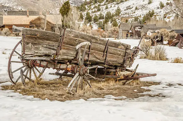 Dilapidated wagon on a winter day in a Montana ghost town