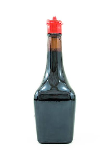 istock Bottle of soy sauce isolated on white background 521438745