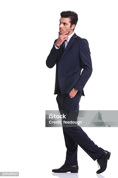 Business Man Walking With One Hand In His Pocket Stock Photo - Download Image Now - Adult, Adults Only, Arts Culture and Entertainment