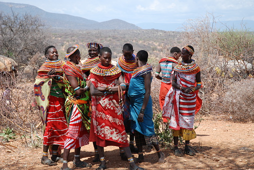 Samburu and Turkana Village, Kenya - August 11, 2007: This village was located next to the Samburu National Park.  It was a little different than most as it was comprised of two different tribes: the Turkana and the Samburu.  After the women performed, they invited members of the audience to participate.