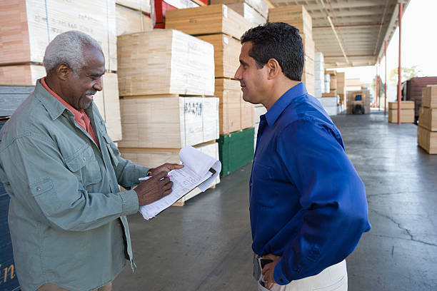 istock Men stock-taking in warehouse 521441229