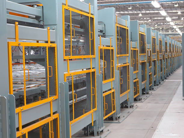 istock Yellow iron fence factory 521441615