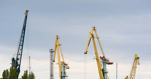 Cranes in the seaport Cranes against the sky in the seaport of Inkerman, Sevastopol. Crimea inkerman stock pictures, royalty-free photos & images