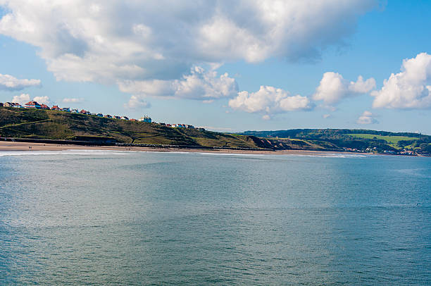 istock View of Whitby beach in a sunny autumn day. 521453019