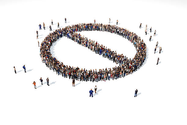 istock Group of people forming a no entry symbol 521457776