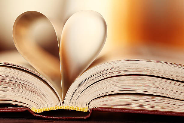 istock heart of the book leaves background 521458855