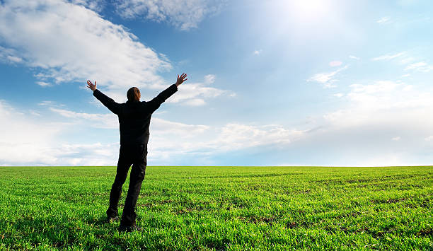 istock Man in meadow green meadow 521458938