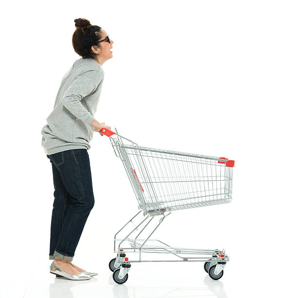 istock Woman with shopping cart 521459698
