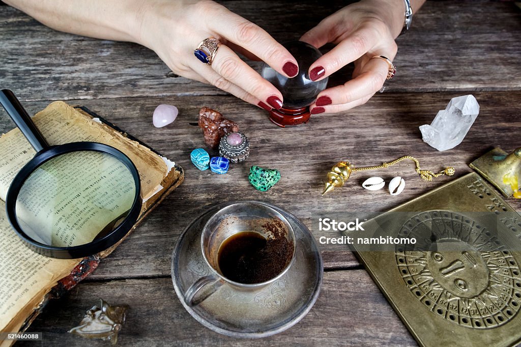 Fortune teller woman predicting future from cards Fortune teller woman predicting future from tarot cards Astrology Stock Photo