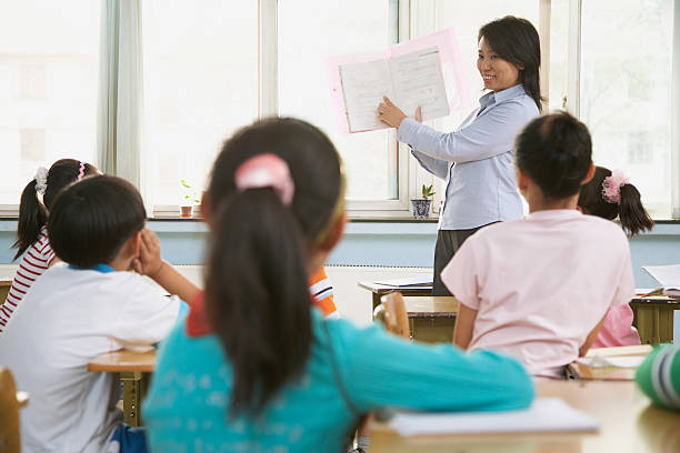 istock Chinese students in classroom at school 521462652