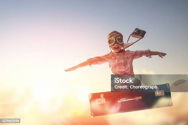 Dreams Of Travel Stock Photo - Download Image Now - Child, Day Dreaming, Suitcase