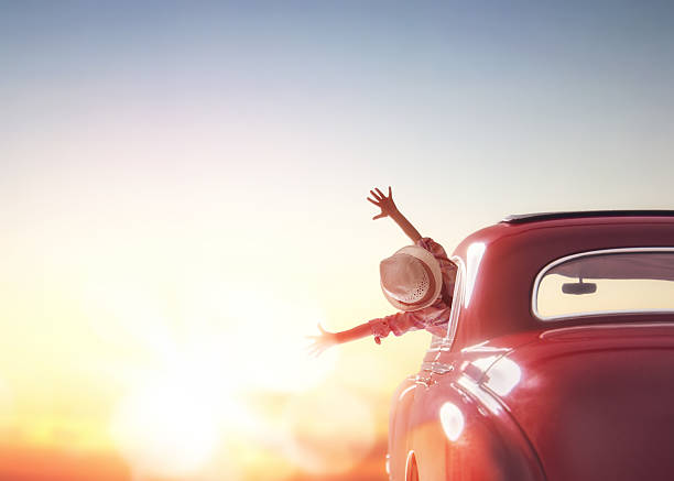 istock girl rides into the sunset 521463772