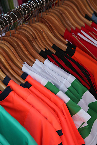Row of Tshirts hanging on coathangers