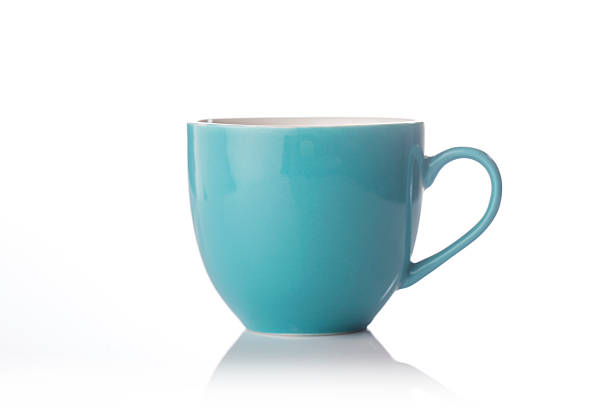 istock Beautiful teal color tea cup 521465534