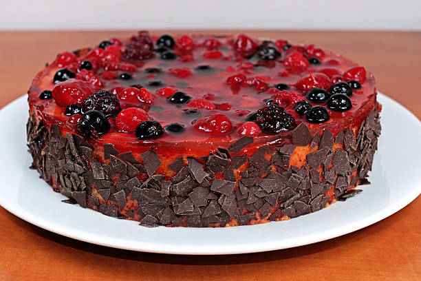 istock Homemade fruit jelly cake with raspberries and wild berries 521466034