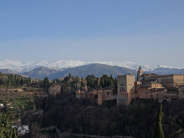 istock alhambra photo with mountains background 521466468