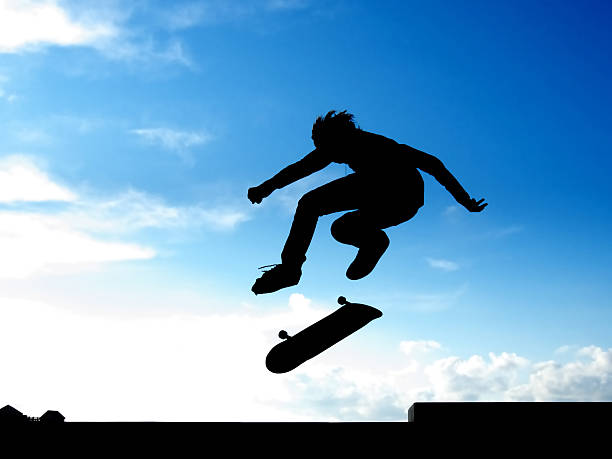 Angry man holding his skateboard after it was broken by accident