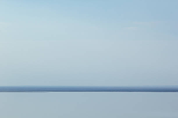 istock Light blue minimalist landscape with a horizon line. Copy space. 521468298