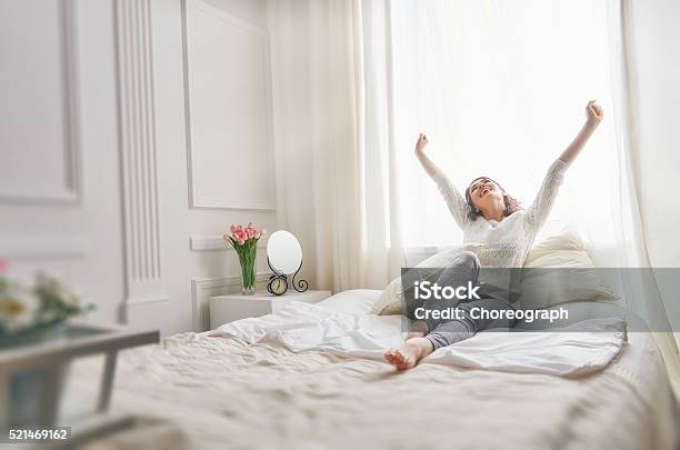 Happy Beautiful Woman Stock Photo - Download Image Now - Bed - Furniture, Women, Happiness