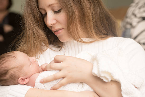 istock Infant boy on the mother hands 521469184