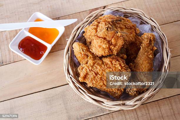 Crispy Fried Chicken In A Basket Stock Photo - Download Image Now - Brown, Cooked, Crockery