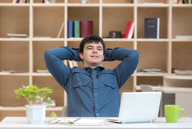 istock Happy young Man enjoying Job well done 521471668