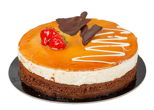 Chocolate cake with caramel on top isolated