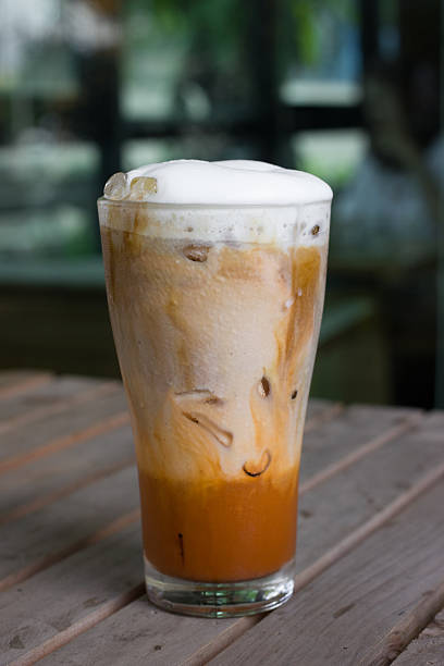 istock Iced coffee with milk is on the table. 521486267