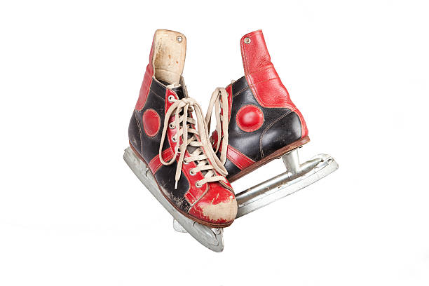 istock pair of vintage ice skates, white background 521486765