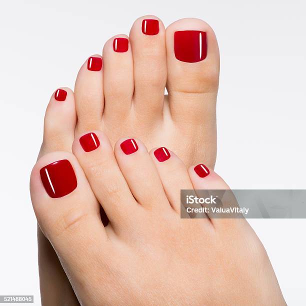 Beautiful Female Feet With Red Pedicure Stock Photo - Download Image Now - Pedicure, Beauty, Toenail