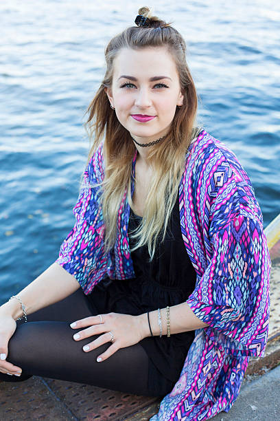 istock young woman by the waterfront 521489679