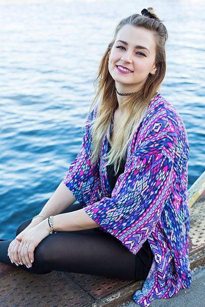 istock young woman by the waterfront 521489685