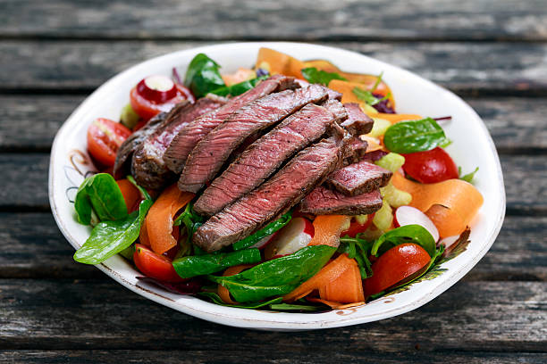 istock Spicy Beef Slices Meat Salad with vegetables 521492346