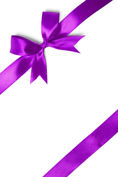 istock Shiny purple satin ribbon on white background 521493595