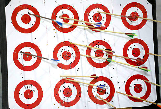 istock Red targets with colorful arrows 521493894