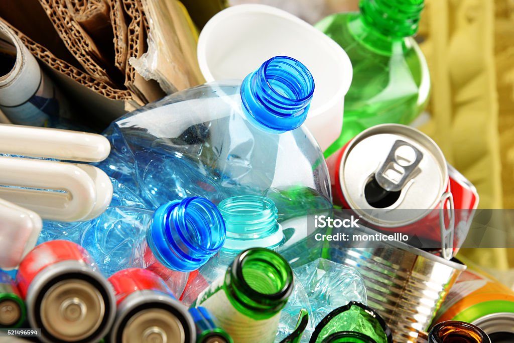 Recyclable garbage consisting of glass, plastic, metal and paper Recyclable garbage consisting of glass, plastic, metal and paper. Recycling Stock Photo