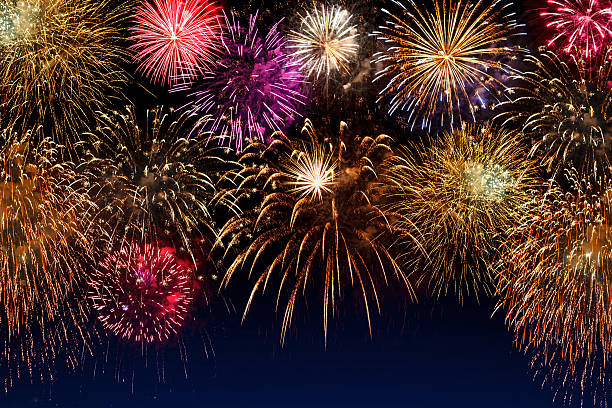 istock beautiful fireworks in the night sky. 521498230