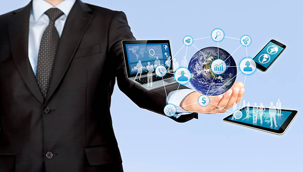 istock Businessman holds modern technology in hands 521498614