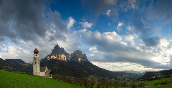 St. Valentin church with Mount Santner and Mount Schlern, Dolomites, Italy