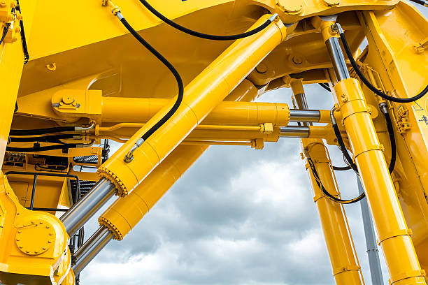 Excavator Hydraulic cylinder on big excavator. hydraulics stock pictures, royalty-free photos & images