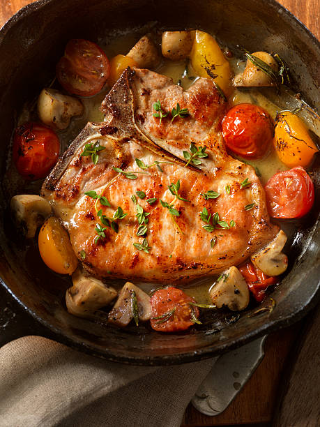 istock Pork Chops with Tomatoes and Mushrooms 521501400