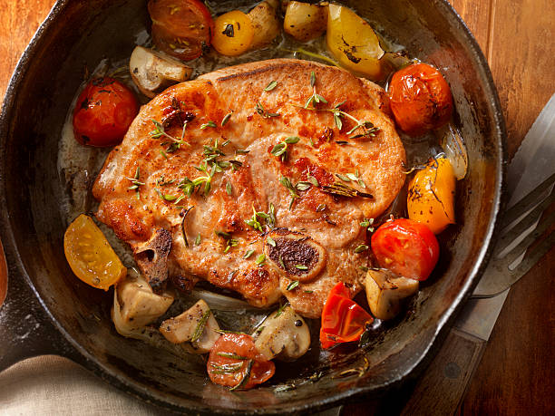 Pork Loin Chops with Tomatoes and Mushrooms