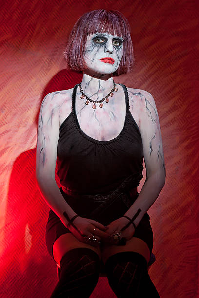 istock Vampire girl on a red background 521502626