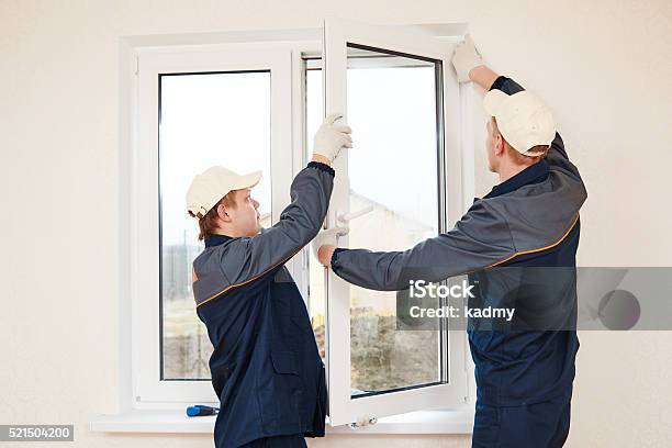 Windows Installation Worker Stock Photo - Download Image Now - Window, Installing, Repairing